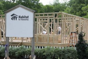 studios donate plywood to habitat for humanity